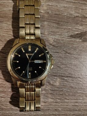 Seiko Gold and Black Wrist Watch